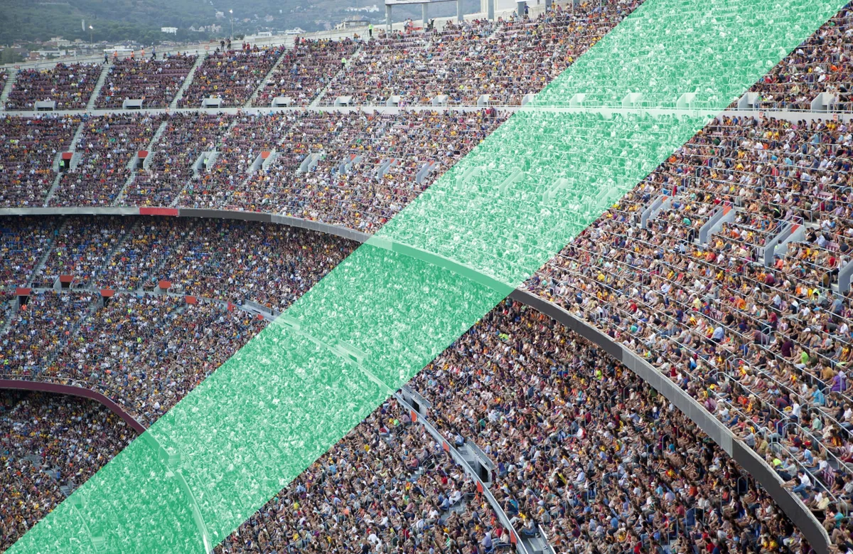 A section of a stadium full of people with a large part highlighted to represent isolating audiences with accessibility challenges.