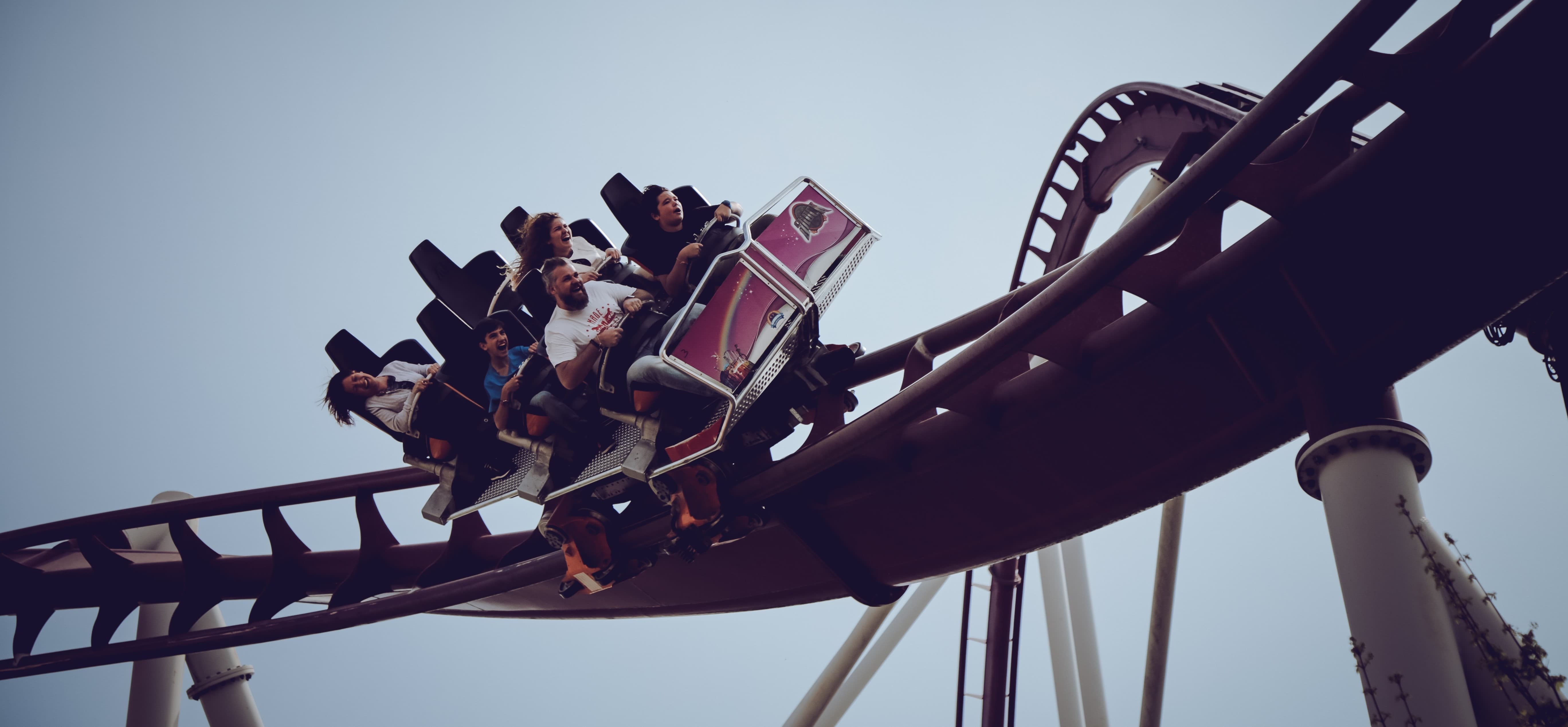 People on a rollercoaster