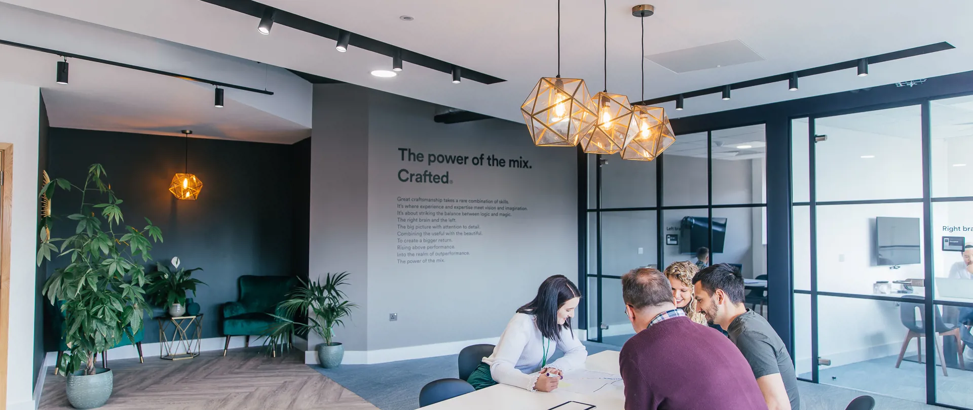 office entrance team working around a table