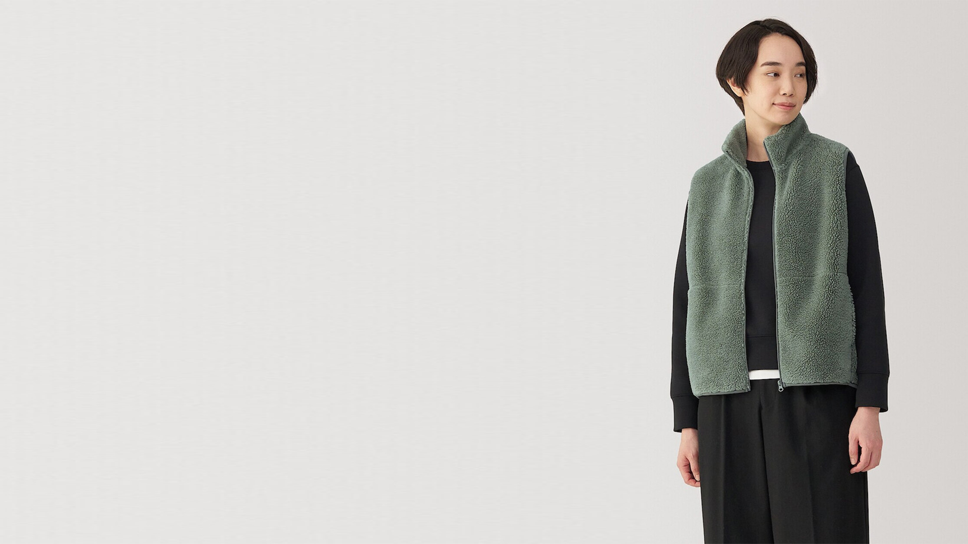 Model wearing MUJI clothing products